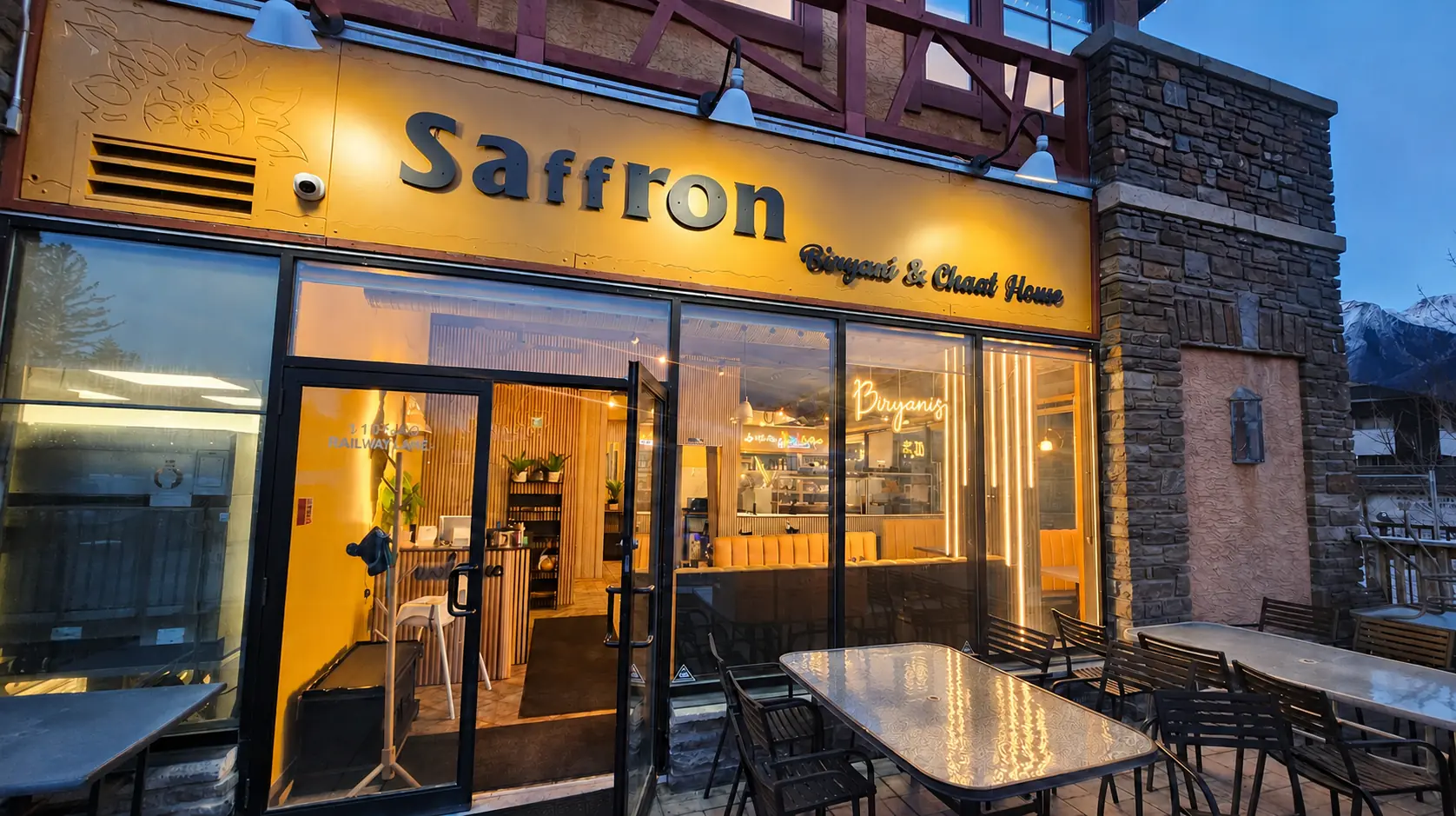 Saffron Canmore Biryani and Chaat House storefront with patio seating on Railway Avenue in downtown Canmore Alberta