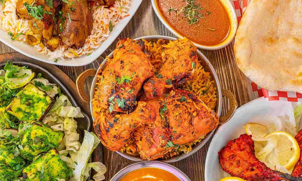 Saffron Indian Bistro thali platter - Indian food delivered to Cascade, AB