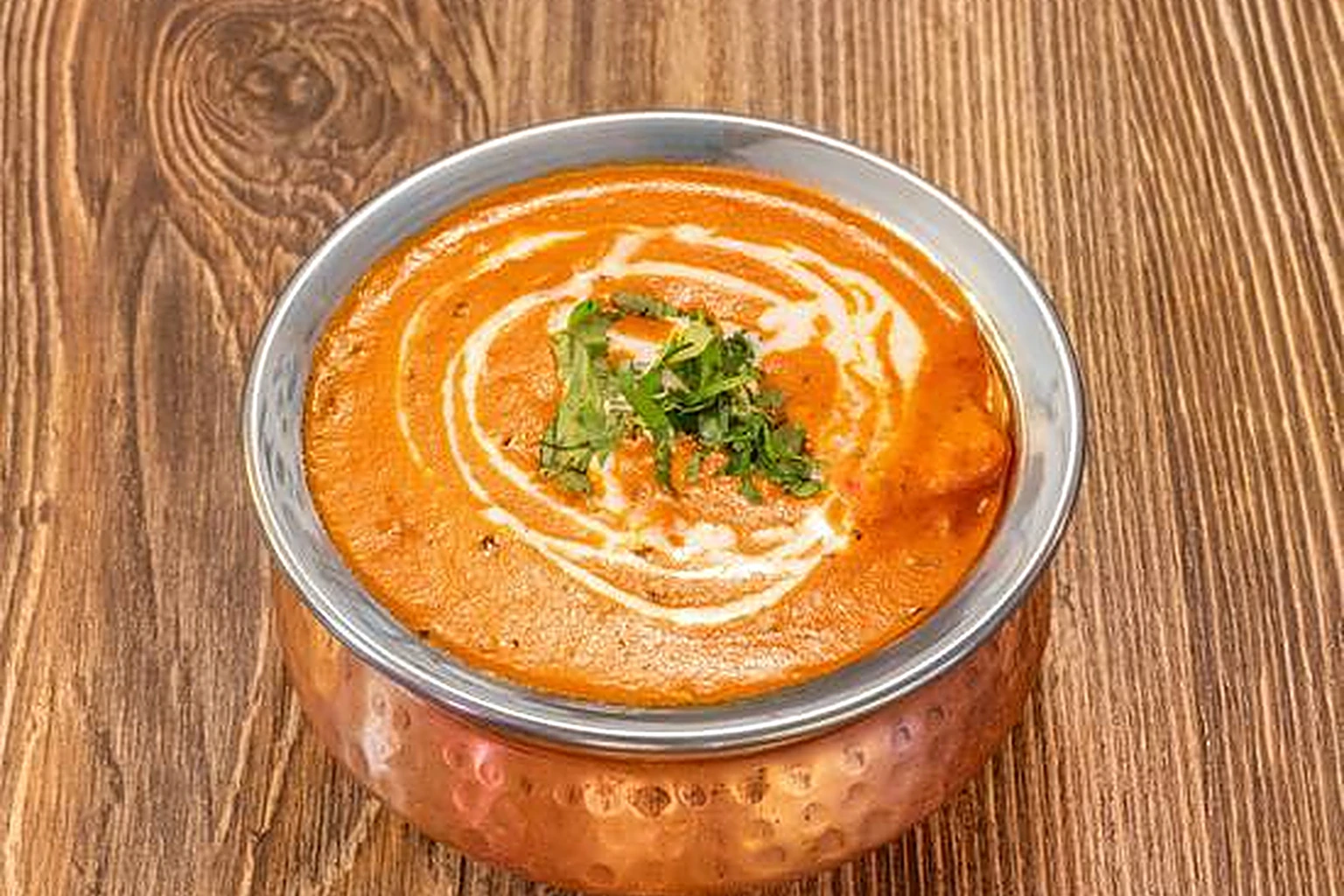 Butter Chicken at Saffron Indian Bistro Banff - tender chicken in a creamy tomato curry