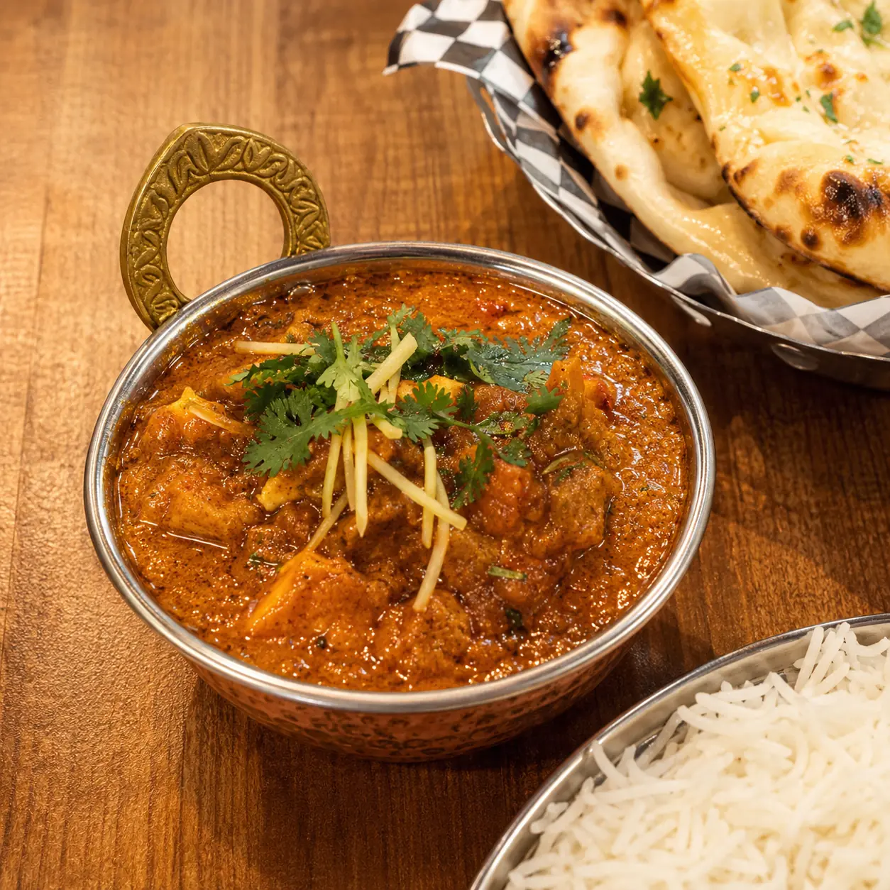 Chicken tikka masala at Saffron Indian Bistro Banff – tandoori chicken in a spiced tomato cream sauce