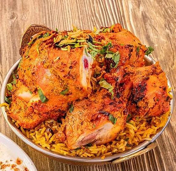 Tandoori chicken tikka at Saffron Canmore - the marinated, tandoor-grilled filling in our chicken tikka roll